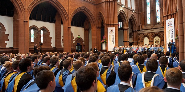 Students in graduation gowns sitting in the Barony Hall during the graduation ceremony. Students in graduation gowns sitting in the Barony Hall during the graduation ceremony.